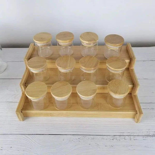 12pcs glass spice jar set with a brown bamboo stand